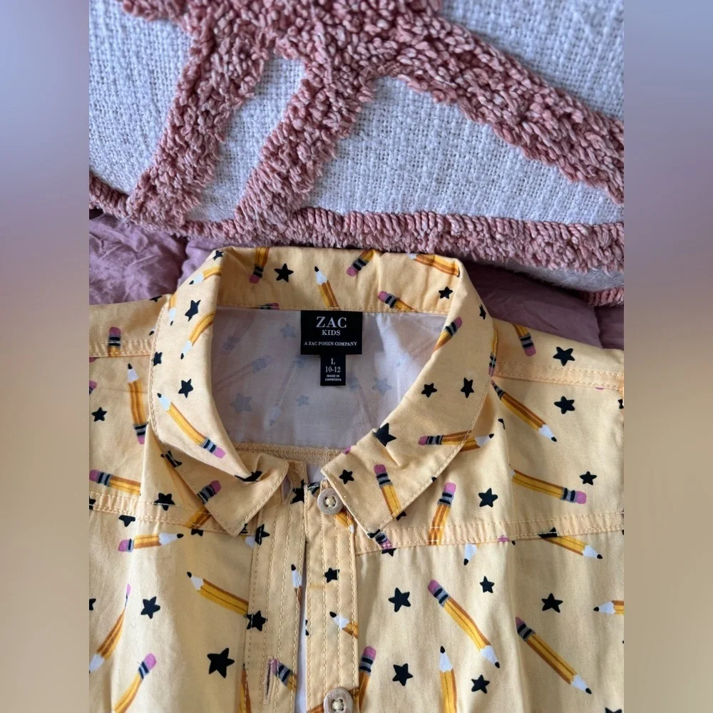 Girls size large (10/12)  school dress with pencils